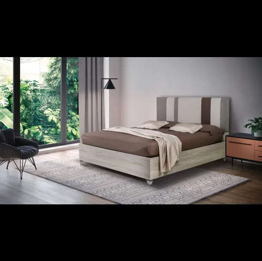 Letto Mistral con testiera imbottita e giroletto in legno di Noi della Notte